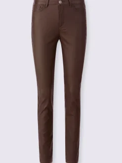 Pantalon effet ventre plat avec coupe skinny et brillance raffinée