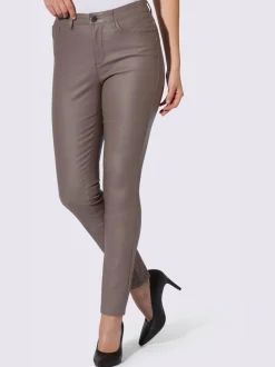 Pantalon effet ventre plat avec coupe skinny et brillance raffinée
