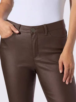 Pantalon effet ventre plat avec coupe skinny et brillance raffinée
