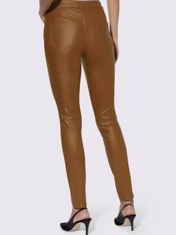 Pantalon effet ventre plat avec coupe skinny et brillance raffinée