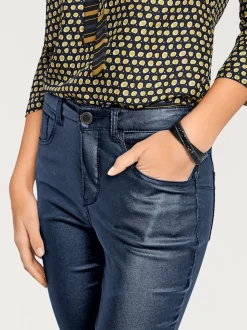 Pantalon effet ventre plat avec coupe skinny et brillance raffinée