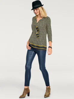 Pantalon effet ventre plat avec coupe skinny et brillance raffinée
