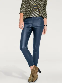 Pantalon effet ventre plat avec coupe skinny et brillance raffinée