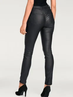 Pantalon effet ventre plat avec coupe skinny et brillance raffinée