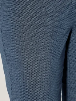 Pantalon 7/8 en coton à 5 poches et détails rivetés