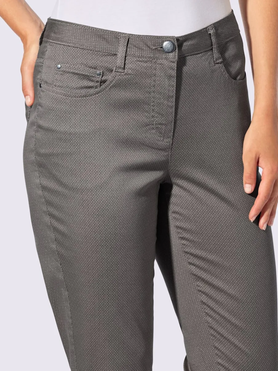 Pantalon 7/8 en coton à 5 poches et détails rivetés