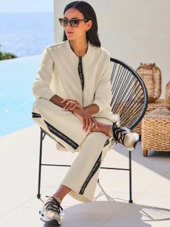 Pantalon en jersey avec rayures contrastées et poches latérales