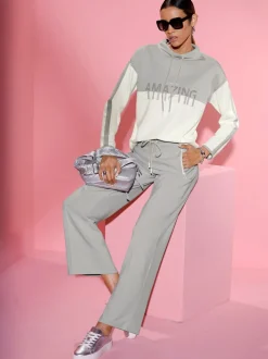 Pantalon en jersey à large ceinture et poches zippées
