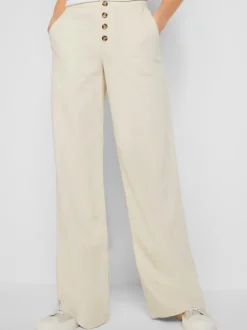 Pantalon en lin avec ceinture élastiquée et poches devant