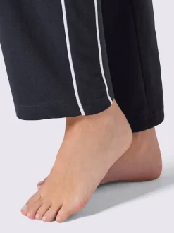 Pantalon en matière sweat avec ceinture élastique et passepoil sportif