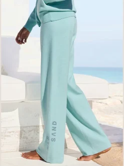 Pantalon en tricot doux avec ceinture élastique et jambes larges