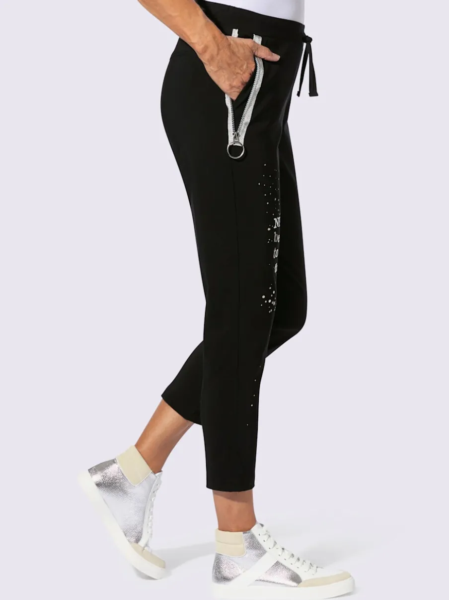 Pantalon extensible avec inscription décorative et poches zippées