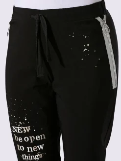 Pantalon extensible avec inscription décorative et poches zippées