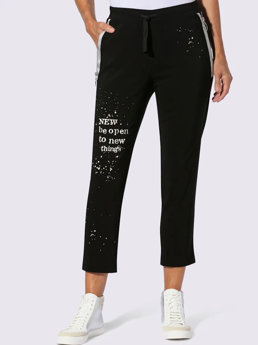 Pantalon extensible avec inscription décorative et poches zippées