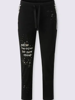 Pantalon extensible avec inscription décorative et poches zippées