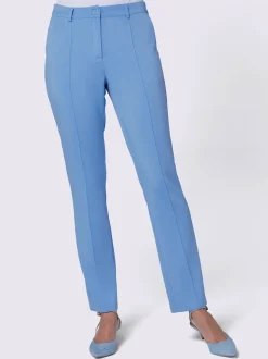 Pantalon extensible à poches et nervures pour un effet affinant