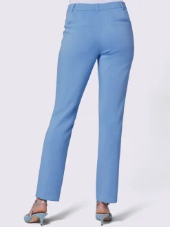 Pantalon extensible à poches et nervures pour un effet affinant