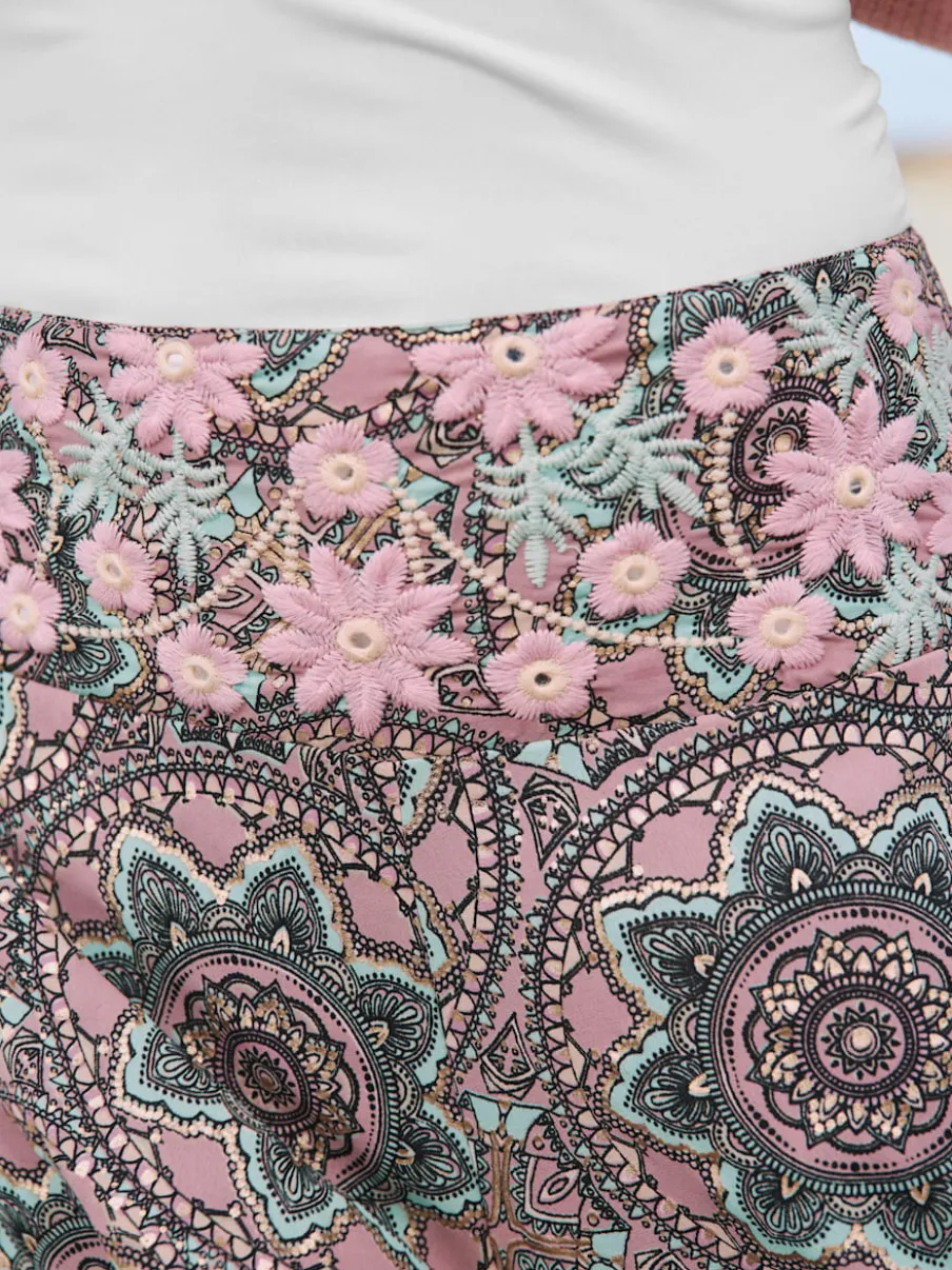 Pantalon à fleurs avec large jambes et poches cousues