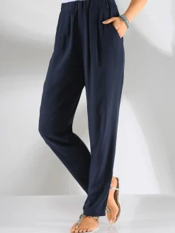 Pantalon fluide avec ceinture élastique et poches latérales