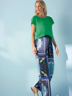 Pantalon fluide à motif avec ceinture élastique et poches latérales