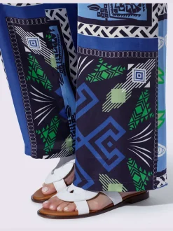 Pantalon fluide à motif avec ceinture élastique et poches latérales