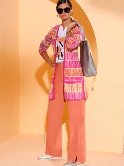 Pantalon fluide à pinces avec poches et fentes à l'ourlet