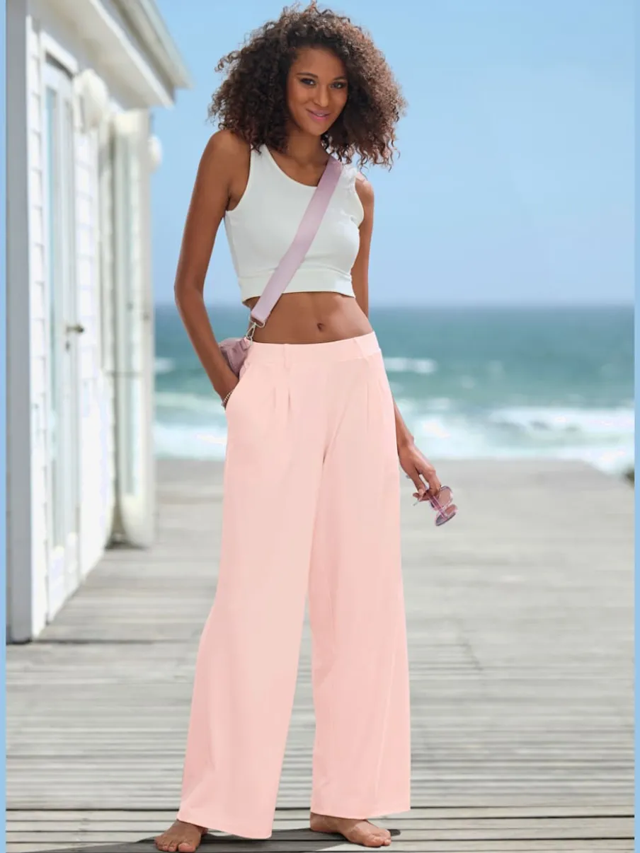 Pantalon fluide à taille haute avec poches latérales et jambes larges