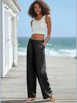Pantalon fluide à taille haute avec poches latérales et jambes larges