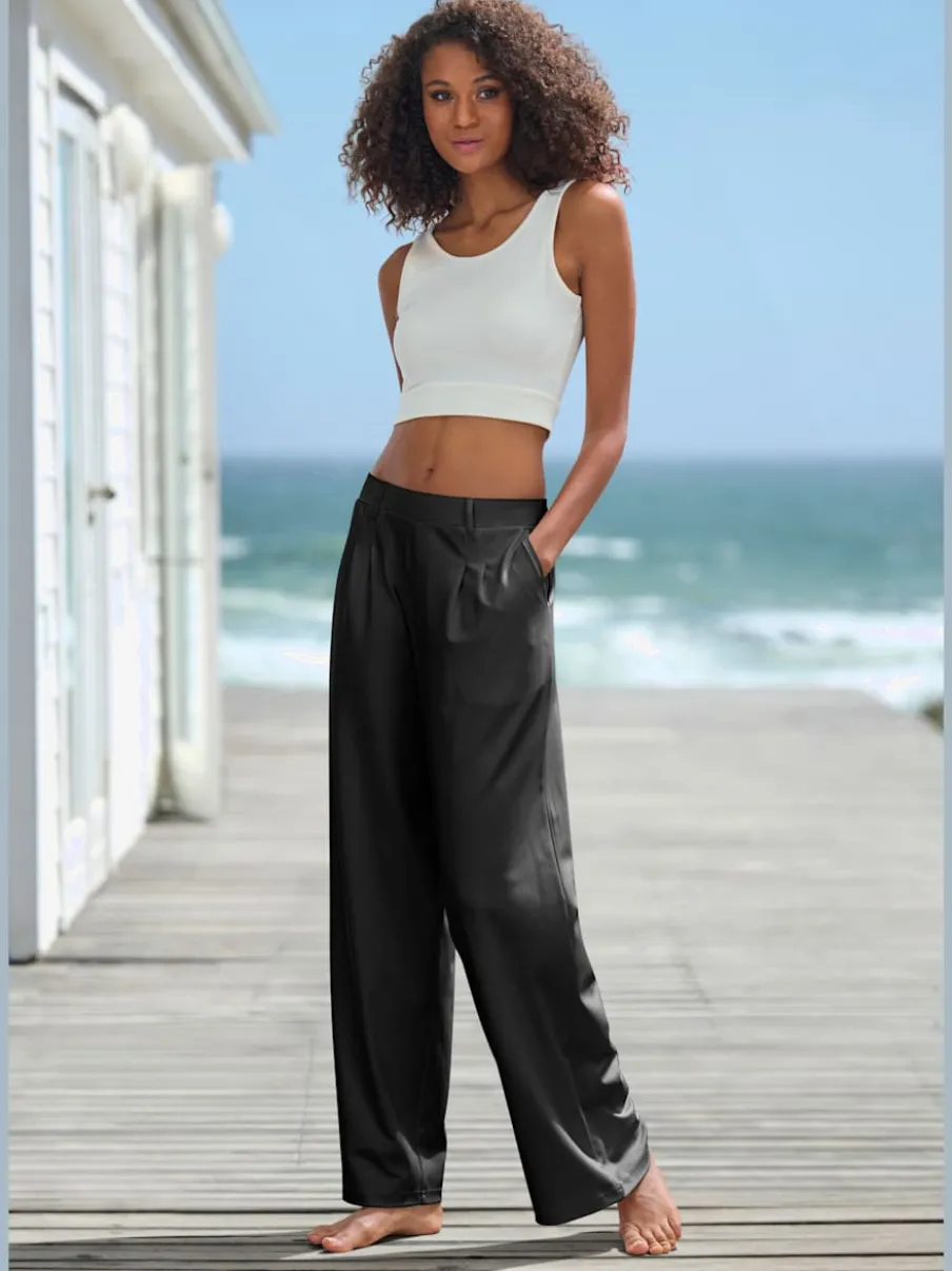 Pantalon fluide à taille haute avec poches latérales et jambes larges