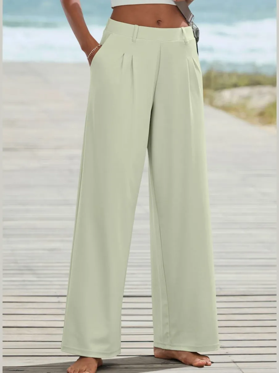 Pantalon fluide à taille haute avec poches latérales et jambes larges