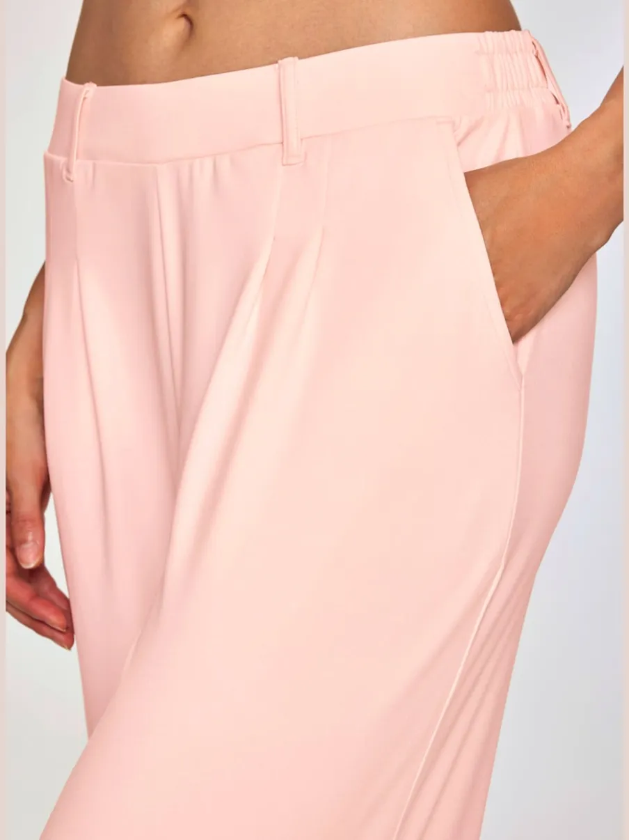 Pantalon fluide à taille haute avec poches latérales et jambes larges