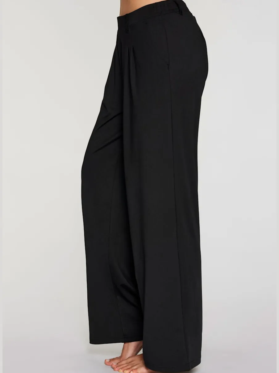 Pantalon fluide à taille haute avec poches latérales et jambes larges