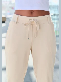 Pantalon jogpant avec poches latérales et lien ajustable