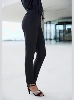 Pantalon jogpant avec poches latérales et lien ajustable