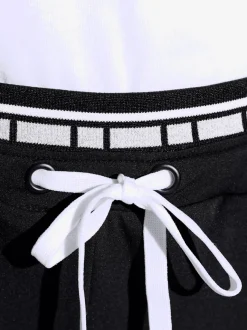 Pantalon jogpant à double ceinture avec poches zippées
