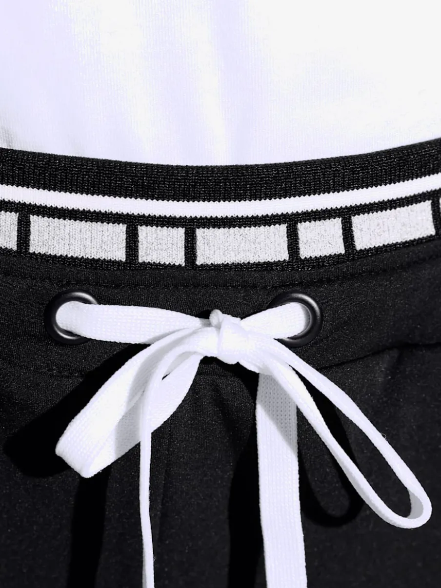 Pantalon jogpant à double ceinture avec poches zippées
