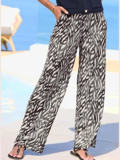 Pantalon large avec ceinture élastique et poches fendues