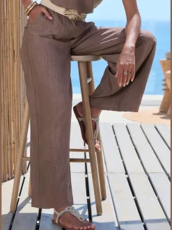 Pantalon large avec ceinture smockée et poches fendues