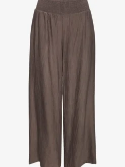Pantalon large avec ceinture smockée et poches fendues