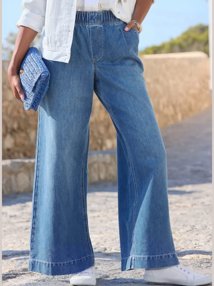 Pantalon large avec ceinture élastique et pinces visibles