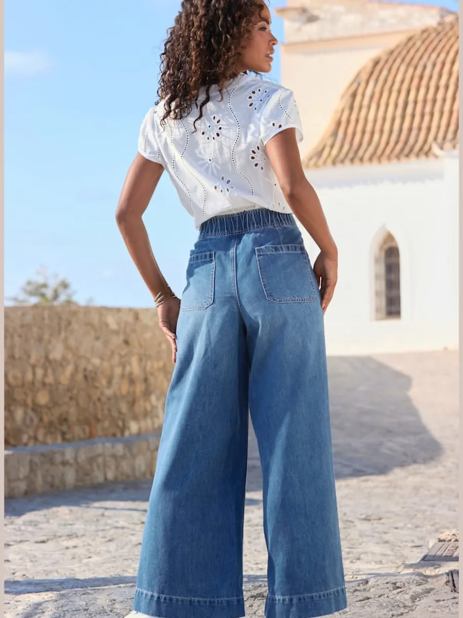 Pantalon large avec ceinture élastique et pinces visibles