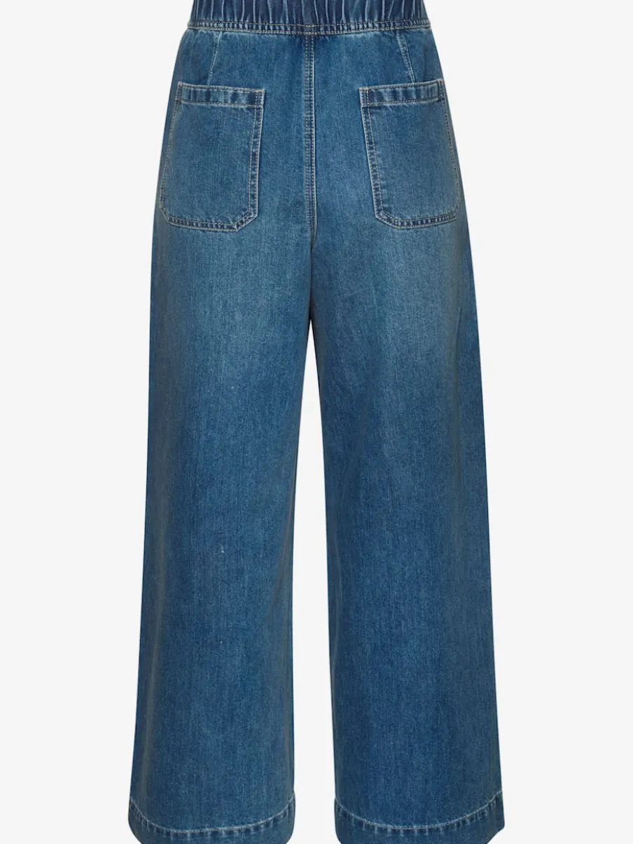 Pantalon large avec ceinture élastique et pinces visibles