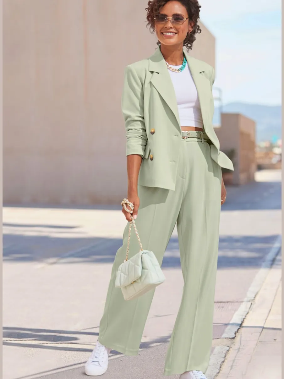 Pantalon large avec pinces à poches fendues et décoratives