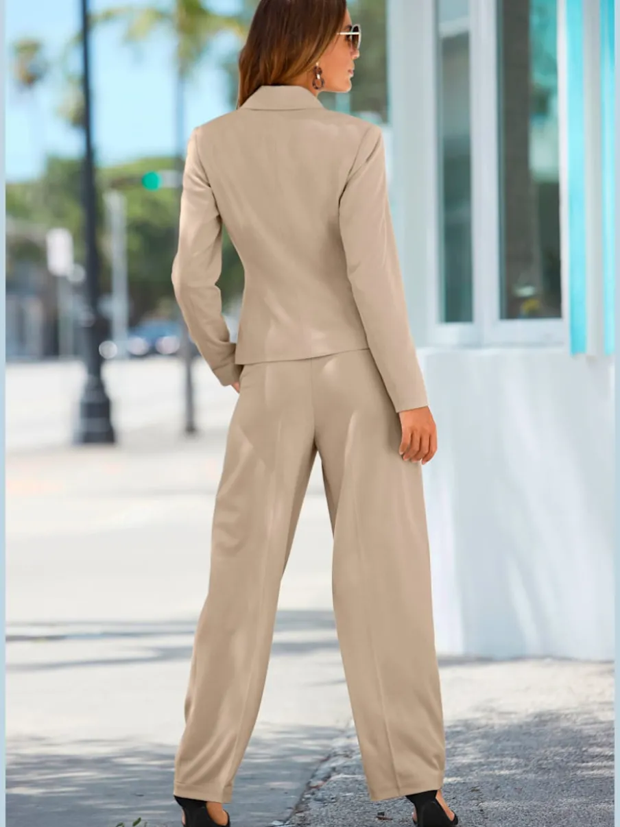 Pantalon large avec pinces à poches fendues et décoratives