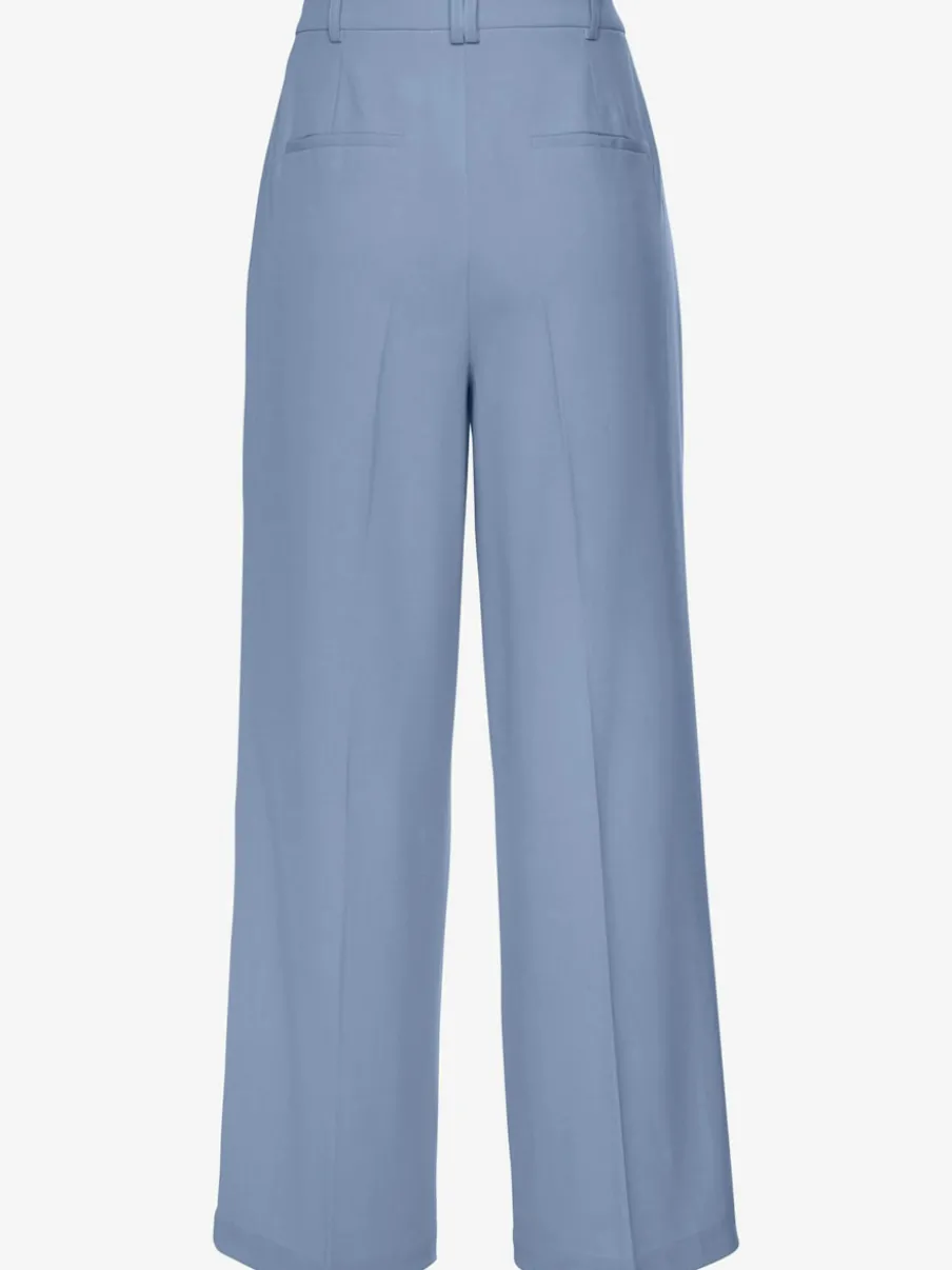 Pantalon large avec pinces à poches fendues et décoratives