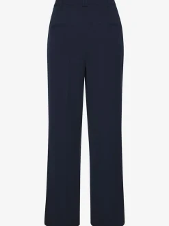 Pantalon large avec pinces à poches fendues et décoratives