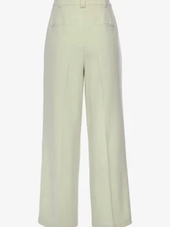 Pantalon large avec pinces à poches fendues et décoratives