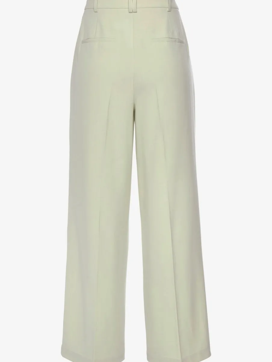 Pantalon large avec pinces à poches fendues et décoratives