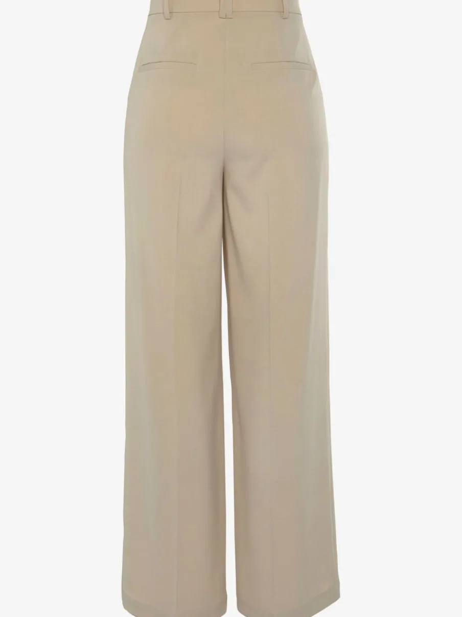 Pantalon large avec pinces à poches fendues et décoratives