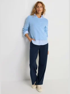 Pantalon large avec pinces à poches fendues et décoratives